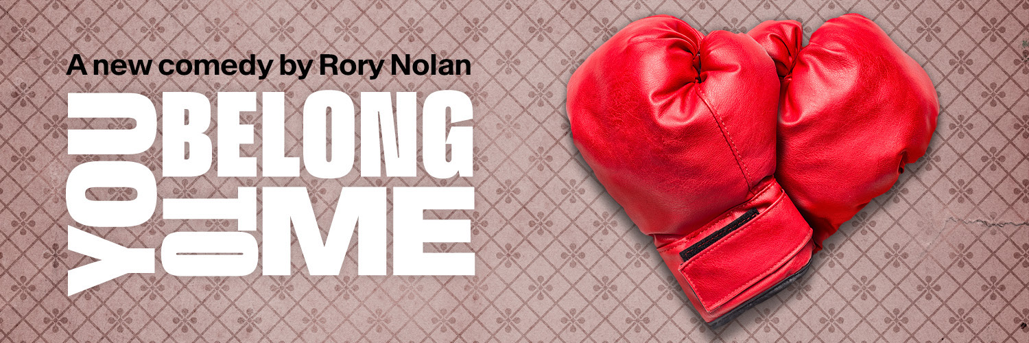 You Belong To Me is written beside two boxing gloves in the shape of a heart.
